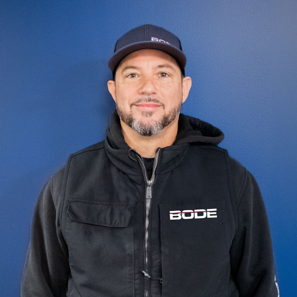 Jeremy Lair Journeyman Electrician Headshot Blue Background