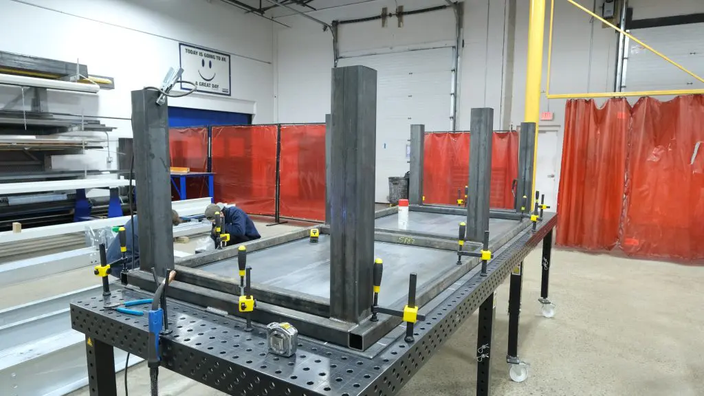 picture of welding tables being assembled