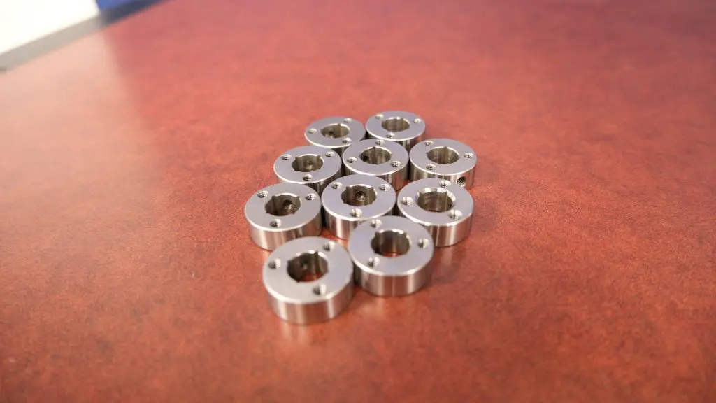 picture of machines parts on wood table
