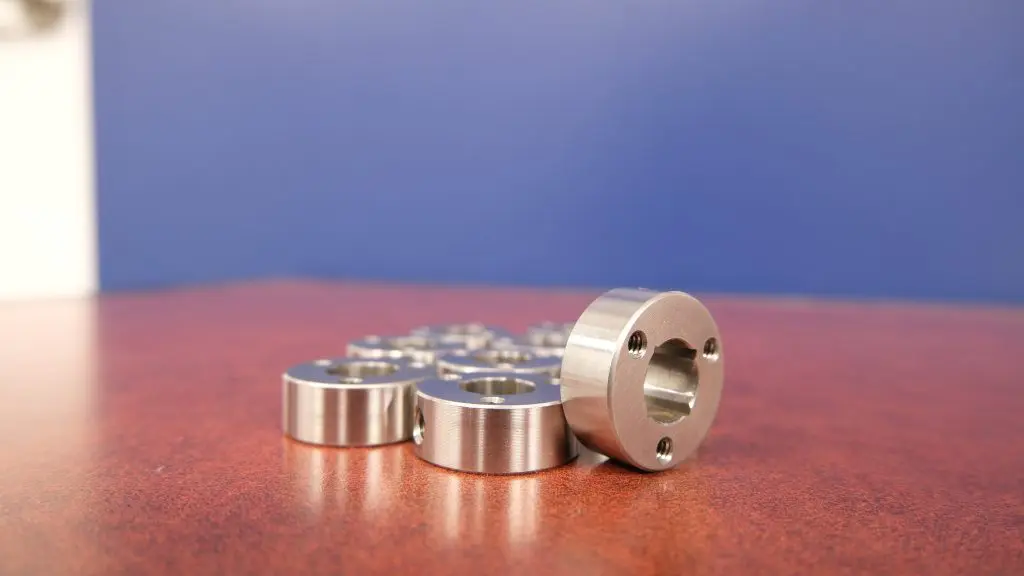 picture of machines parts on wood table